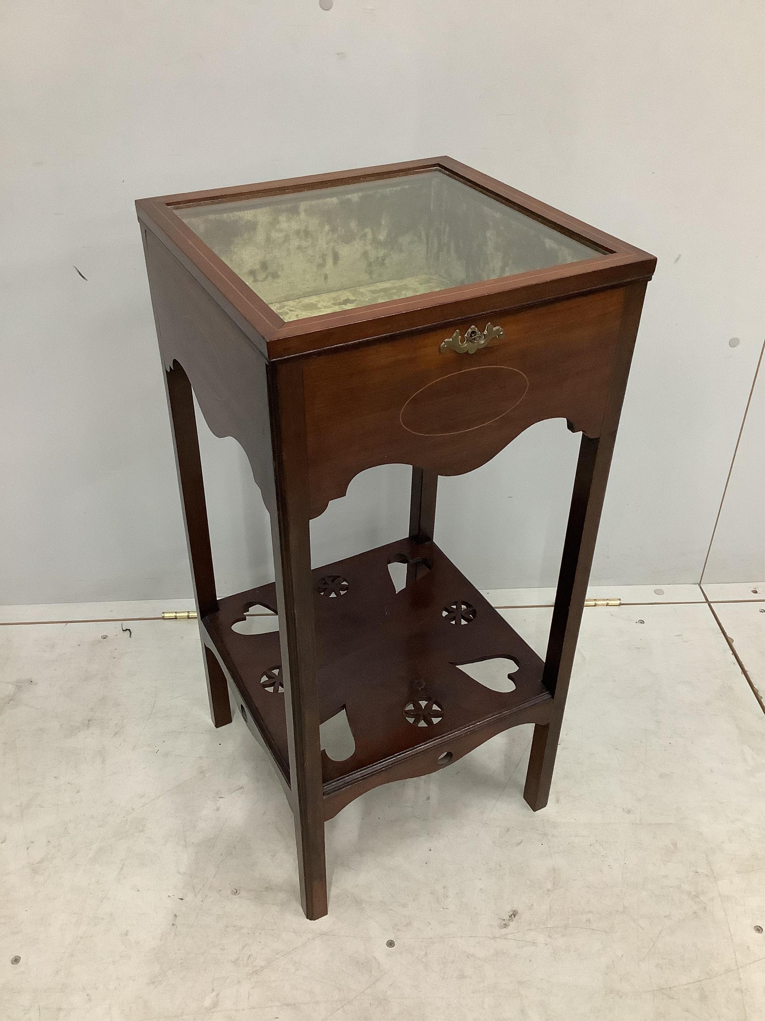 An Edwardian inlaid mahogany bijouterie table, width 36cm, depth 36cm, height 77cm. Condition - good